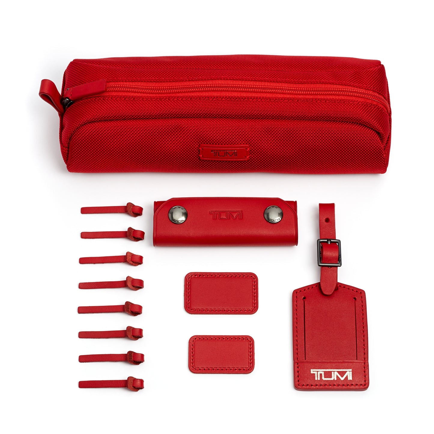 TUMI - Accents Kit - Includes 2 Leather Monogram Patches, 1 Leather Luggage Handle Wrap, 1 Luggage Tag & 8 Leather Zipper Pulls - Cherry